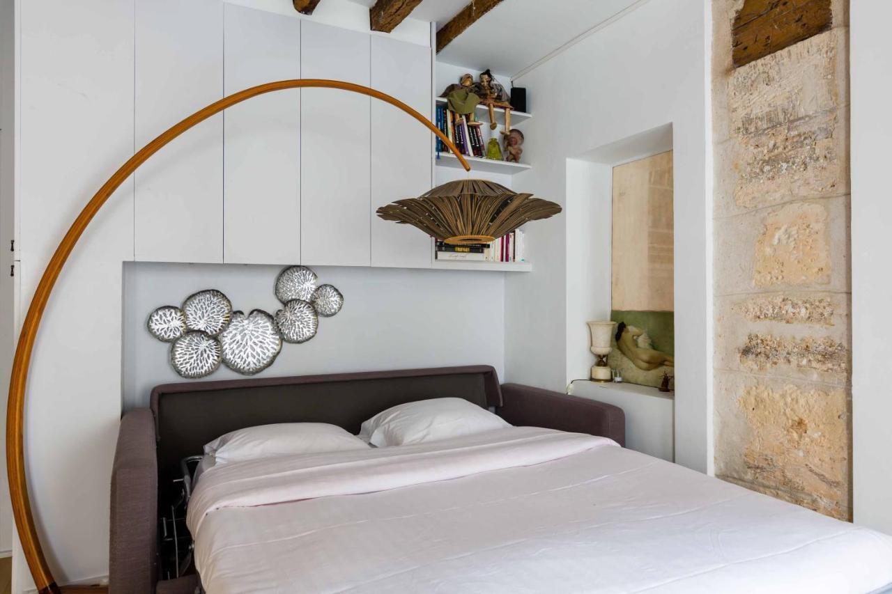 Veeve - Artistic Excellence In The Marais Apartment Paris Bagian luar foto